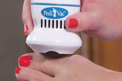 close up of Pedi Vac being used on callus