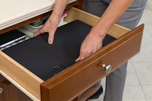 A folded Air Space Laptop Desk put away for storage