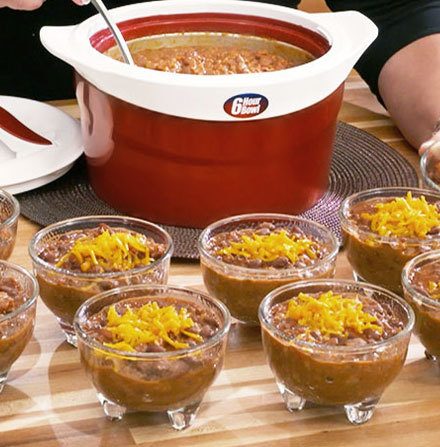 Chilli being served from 6 Hour Bowl into 8 smaller bowls